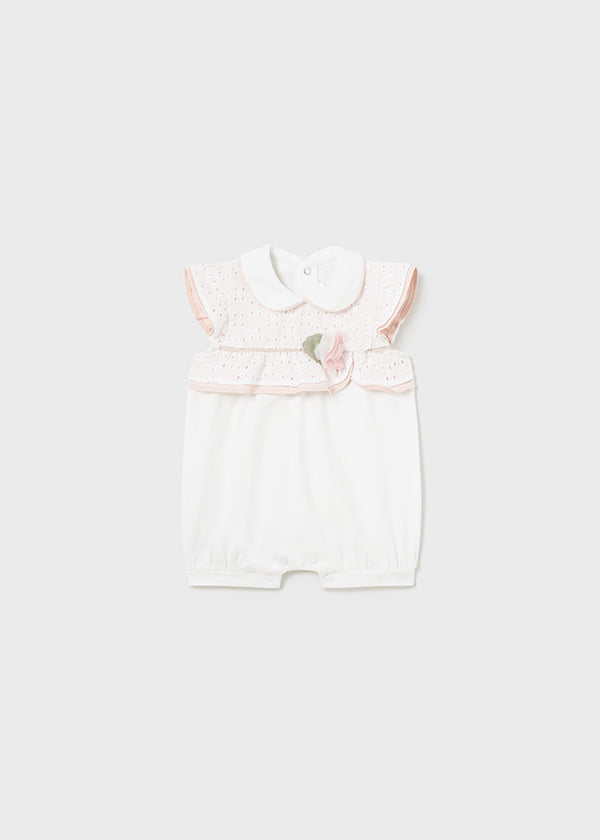 Pagliaccetto elegante bianco neonata