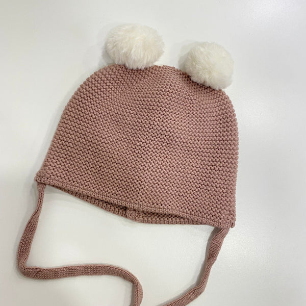 Cappello nascita con ponpon in lana