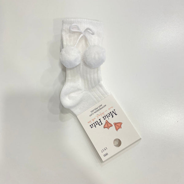High ribbed cream sock with pompoms