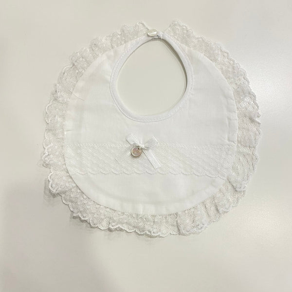 Bib in fabric with lace embroidery